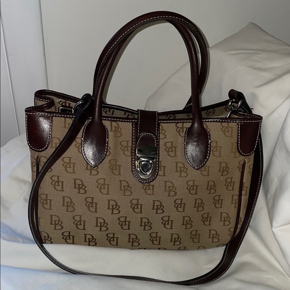 Dooney & Bourke Brown Satchel with Structured Shape and Monogram Pattern